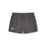 Flatlay of Tetra-Lite Laser Cut 3" shorts in space grey, front view