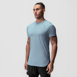 AeroSilver Established Tee in light sky blue, worn by model in three-quarter view