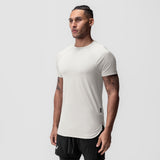 AeroSilver® Established Tee in stone, worn by model in three-quarter view