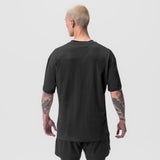 Supima® Mesh Panel Oversized Tee in black, back view on model