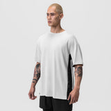 White Supima® Mesh Panel Oversized Tee worn by model, side view
