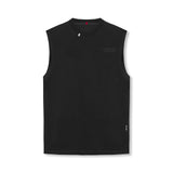 flatlay Tech Essential Relaxed Cutoff sleeveless tank in black, front view