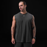 Tech Essential Relaxed Cutoff sleeveless tank in space grey, worn by model, front view