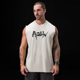 Tech Essential™ Relaxed Cutoff sleeveless tank in stone, worn by model, front view