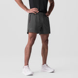 Ultralite 6" Linerless Short in Raven, worn by model standing against white background