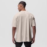 AeroSilver Oversized Tee in beige, back view on model