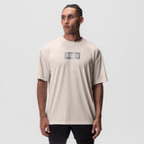 AeroSilver Oversized Tee in beige with box logo, front view on model