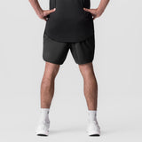 Black Tetra-Lite 7" linerless shorts worn by model, front view