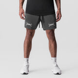 Tetra-Lite 7" Linerless Short in space grey with bracket logo, front view on model