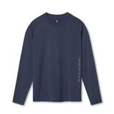 Flatlay of 3D-Lite® 2.0 Fitted Long Sleeve in navy with OTWR text detail, front view