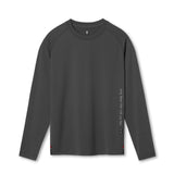 Flatlay of 0832. 3D-Lite® 2.0 Fitted Long Sleeve in space grey with OTWR text detail