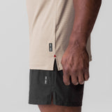 0837. 3D-Lite® 2.0 Muscle Tank in sand worn by model, side detail view
