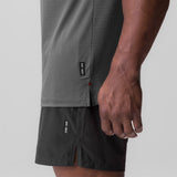 0837. 3D-Lite® 2.0 Muscle Tank in Space Grey, worn by model showing side view