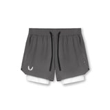 Flatlay of Tetra-Lite 5" Liner Shorts in space grey with white liner and white wings logo, top view