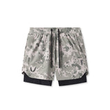 flatlay Tetra-Lite 5" Liner Short in digital camo grey and black, top view