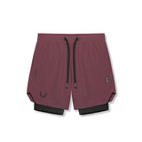 flatlay Tetra-Lite 7" Liner Short in Plum and Black, front view