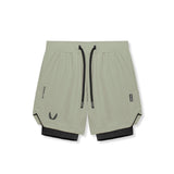 flatlay Tetra-Lite 7" Liner Short in Sage and Black, front view