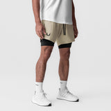 Tetra-Lite 7" Liner Short in sand and black, worn with white socks and sneakers