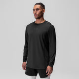 AeroSilver Training Long Sleeve in black with Space Bracket logo, worn by model facing forward