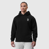 Black Tech Essential Distressed Hoodie worn by model, front view