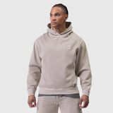 Tech Essential Distressed Hoodie in Faded Chai worn by model, front view