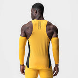 Laser-Vent Singlet Tank in amber and black, worn by model, back view