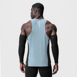 Laser-Vent Singlet Tank in light sky and black worn by male model, back view
