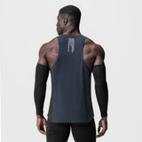 Laser-Vent™ Singlet Tank in navy/black, worn by model from behind