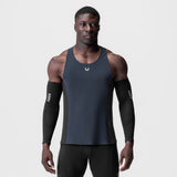 Laser-Vent Singlet Tank in navy/black worn by male model with black arm sleeves, front view