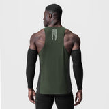 Laser-Vent Singlet Tank in olive green, back view on model wearing black arm sleeves