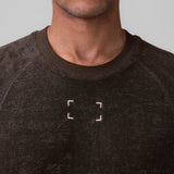Towel Terry Cutoff in Dark Earth worn by model, front view showing embroidered logo detail