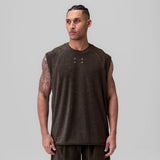 Towel Terry Cutoff sleeveless tee in Dark Earth, worn by model facing forward