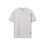 Flatlay of distressed relaxed tee in heather grey, front view