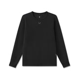 flatlay of black waffle knit longsleeve with small logo detail, front view