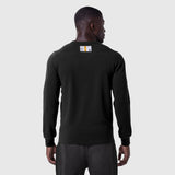 Black waffle knit longsleeve worn by model, back view