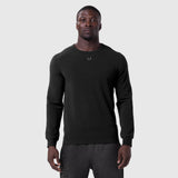Black waffle knit longsleeve worn by model, front view