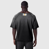 Black vintage raw hem t-shirt worn by model, back view