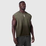 Tech Essential Cap Shoulder Cutoff in olive, worn by model, front view