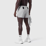 Aerotex 3" Distance Short in slate grey, worn by model from behind