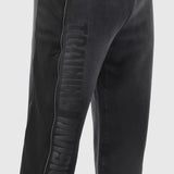 Tech-Terry Mesh Panel Sweats in black, worn on model showing side leg detail