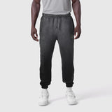 Black Tech-Terry mesh panel joggers worn by model, front view
