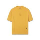 flatlay LYCRA® ADAPTIV Baselayer Shortsleeve in amber yellow, front view