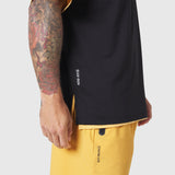 Supima Ice-Skin Reversible Tee in amber and black worn by model showing side view