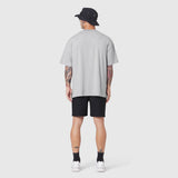 Supima Ice-Skin Reversible Tee in slate grey worn by model from back, paired with black shorts
