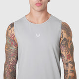 Warpflexx-Lite® Training Tank in slate grey worn by tattooed model, front view
