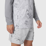 AEROSILVER® UPF50+ Run Long Sleeve in Sedona Snow Camo worn with matching shorts, side view