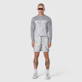 AEROSILVER® UPF50+ Run Long Sleeve in Sedona Snow Camo worn with matching shorts, front view