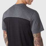 AEROSILVER® UPF50+ Run Tee in black and charcoal colorblock, back view on model