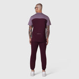 AEROSILVER® UPF50+ Run Tee in merlot with mauve shoulders, back view on model