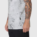 AEROSILVER® UPF50+ Run Tee in Sedona Snow Camo worn by tattooed model, side view